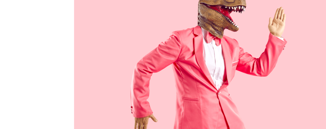 Dancing man in a dinosaur mask